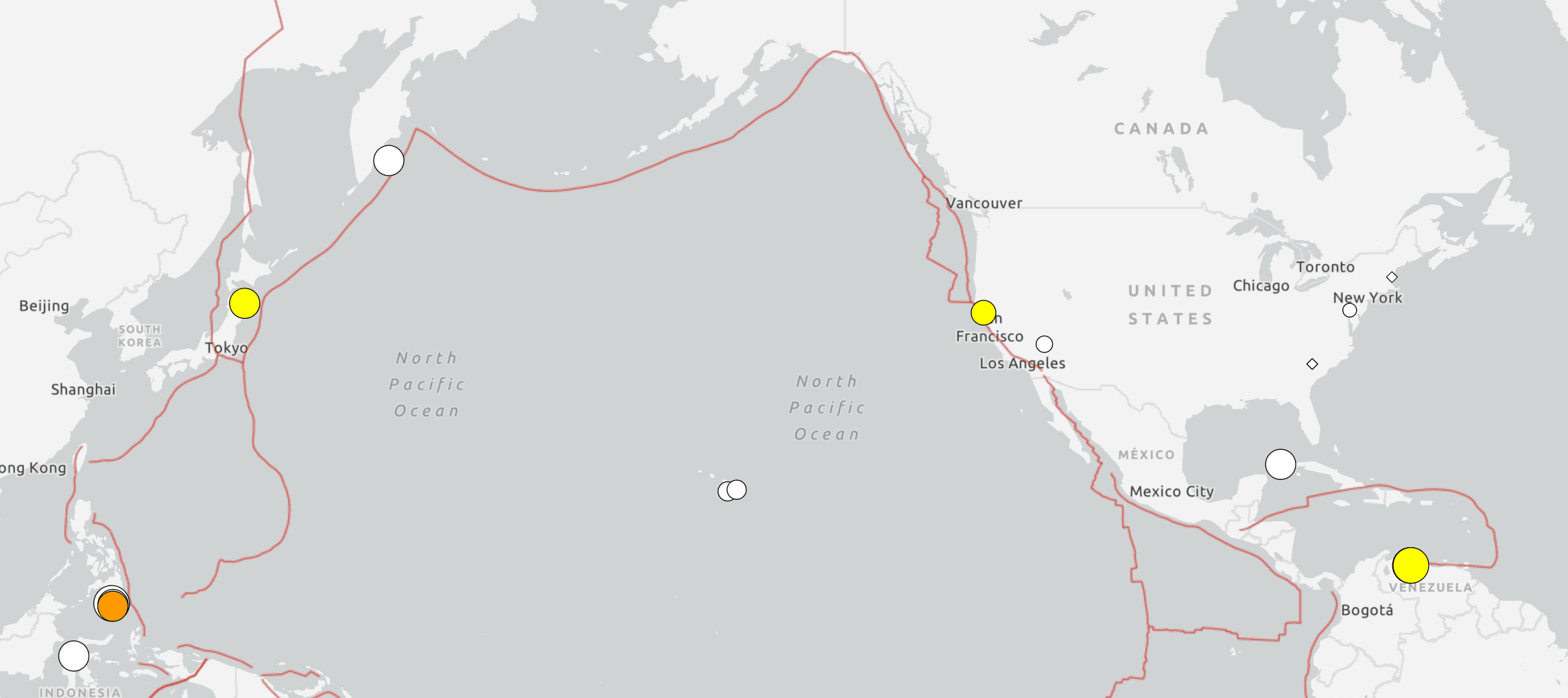 a map with three yellow dots at Japan, California and Venezuela showing major earthquakes