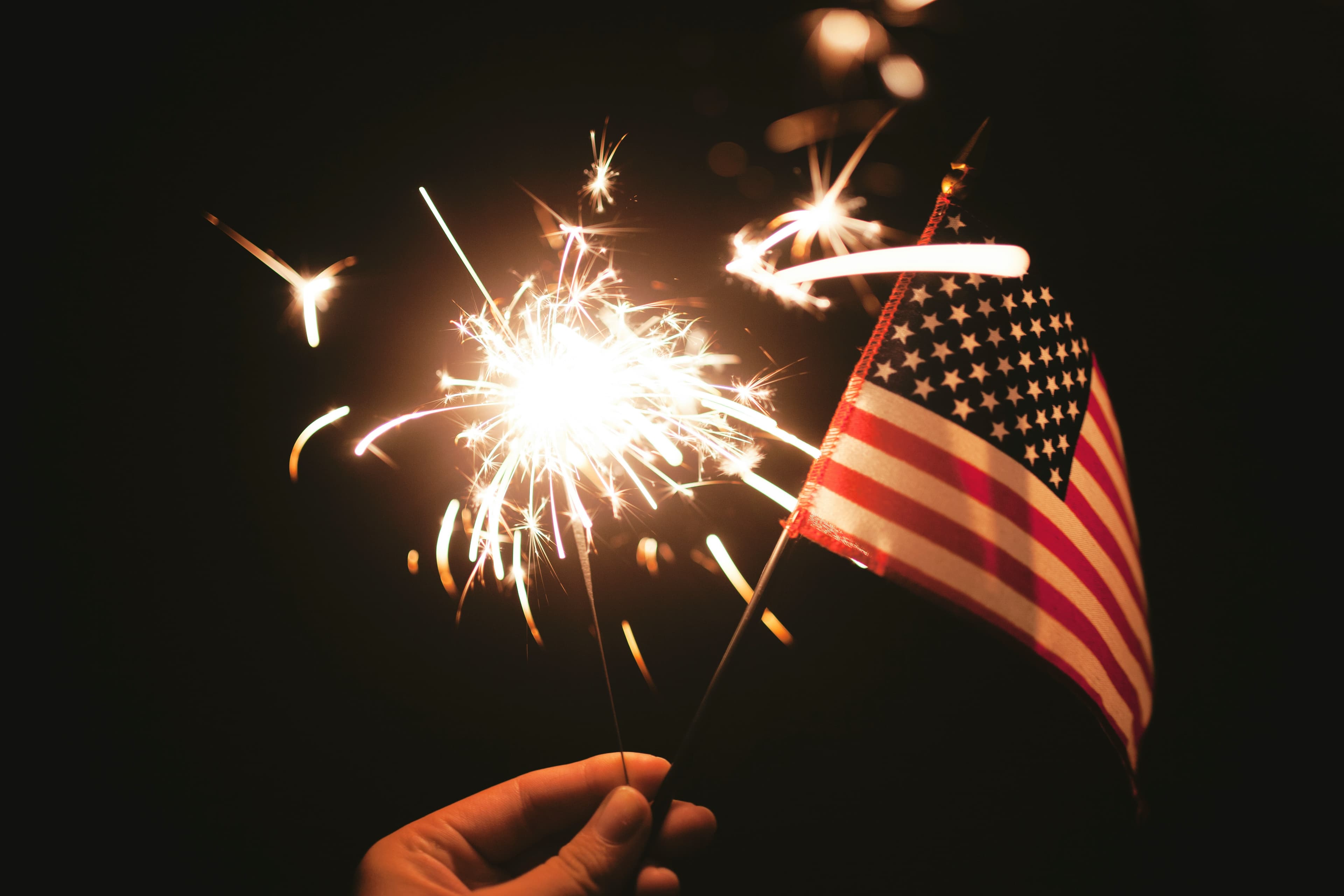 American flag and a sparkler firework