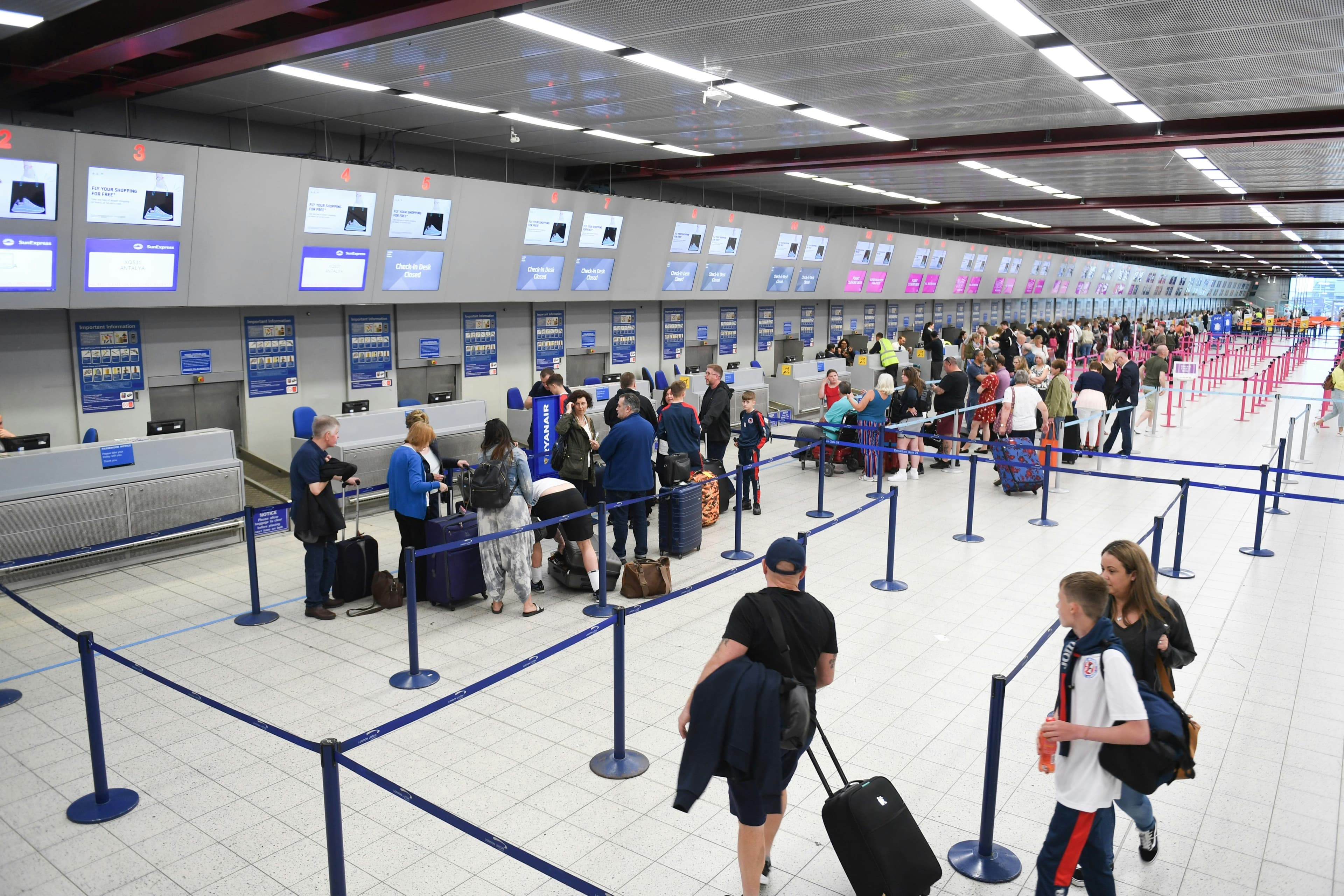 people in line at the airport